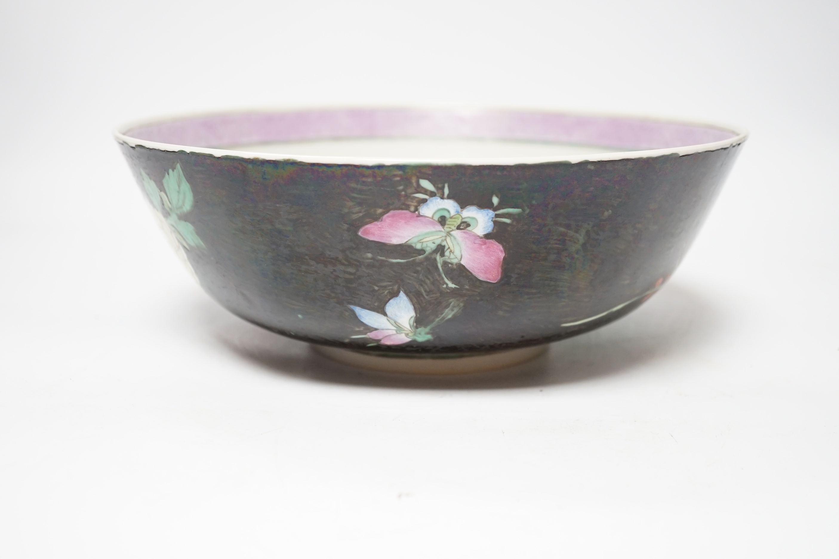 A 19th century Chinese famille noire bowl, 26cm diameter